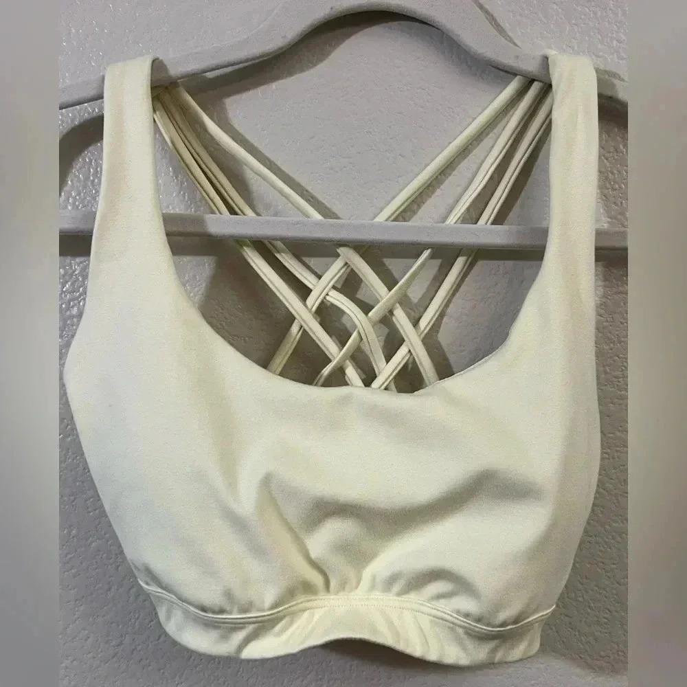 VICTORIA'S SECRET Incredible Essential Strappy Back pale yellow Sports Bra